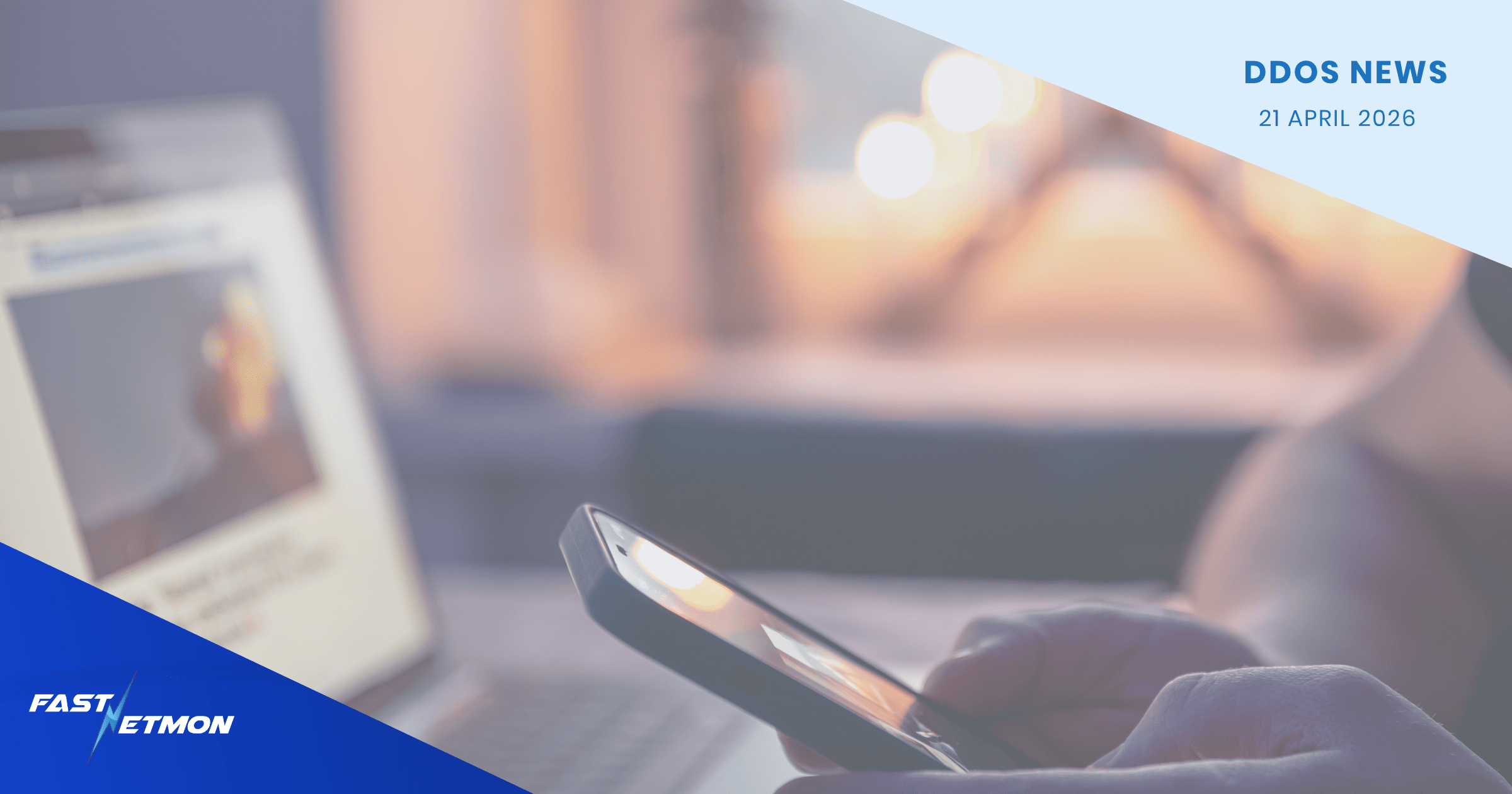 Banner header for DDOS NEWS dated 21 April 2026 with a blurred workspace and a person using a smartphone; FASTNETMON logo in corner.